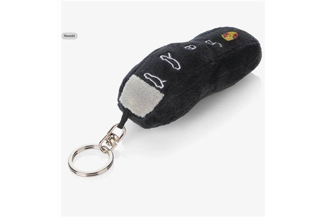 A soft toy keyring in the shape of a car key