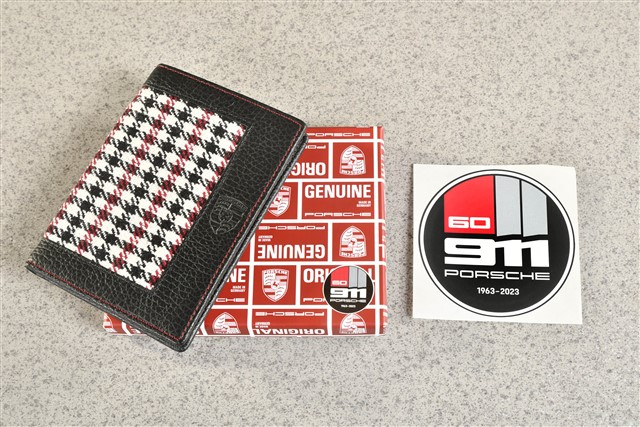"60Y 911" Vehicle registration case "60 Years of 911", in a houndstooth pattern, with an embossed Porsche Crest