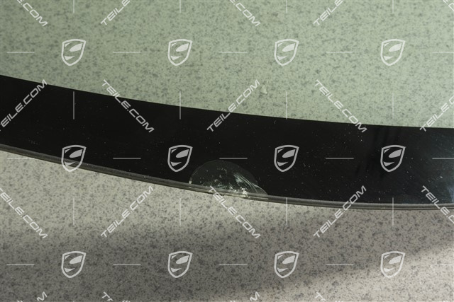 Windscreen with green top tint,  damaged