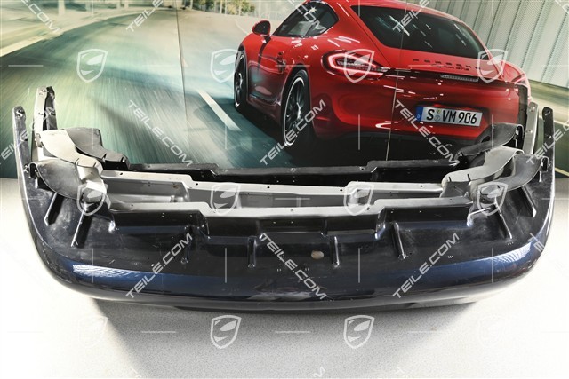 Rear bumper, damaged, with cracks and small bumps