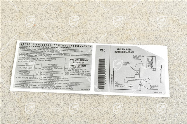 Vehicle emissions control information sticker