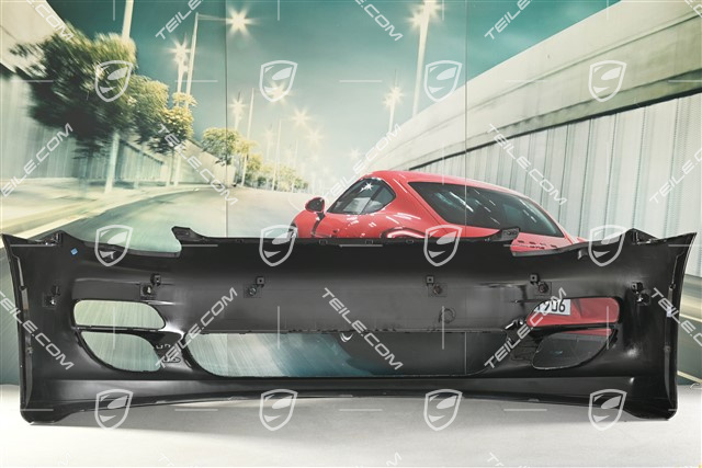 Front bumper with washer holes and parking sensors, painted in black