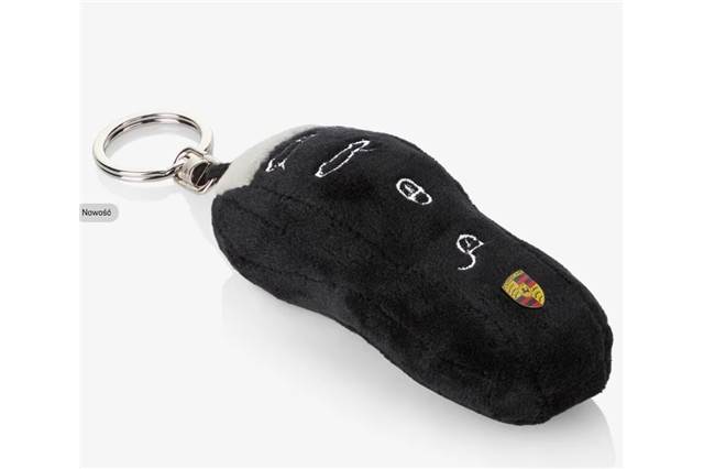 A soft toy keyring in the shape of a car key